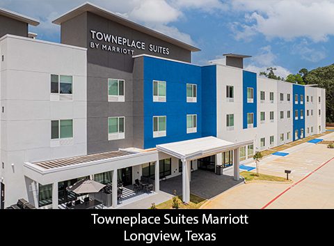Blue and white exterior of TownePlace Suites Longview
